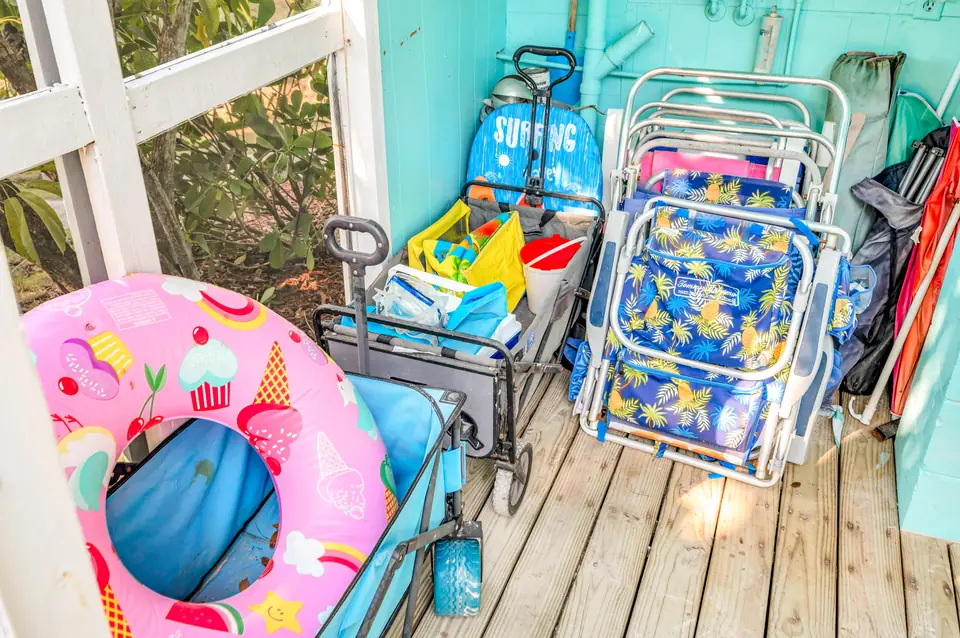 Beach wagons, chairs, and boards ready to borrow