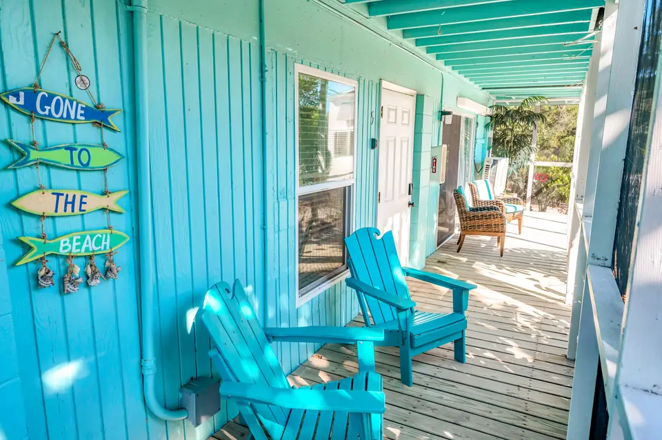 Porch chairs with beach-themed decor